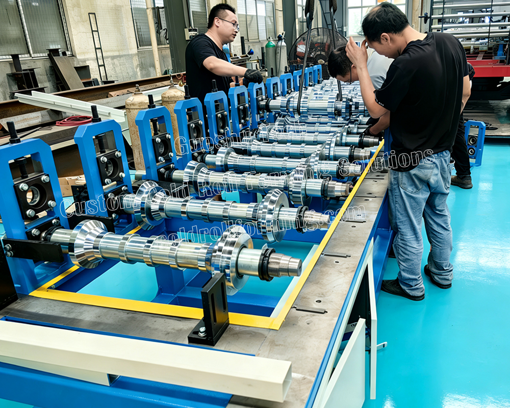 worker-assembling-roller-on-machine.jpg